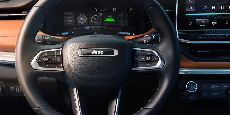 The instrument panel on the 2025 Jeep Compass which can help diagnose service related issues in Wolf Point, MT 